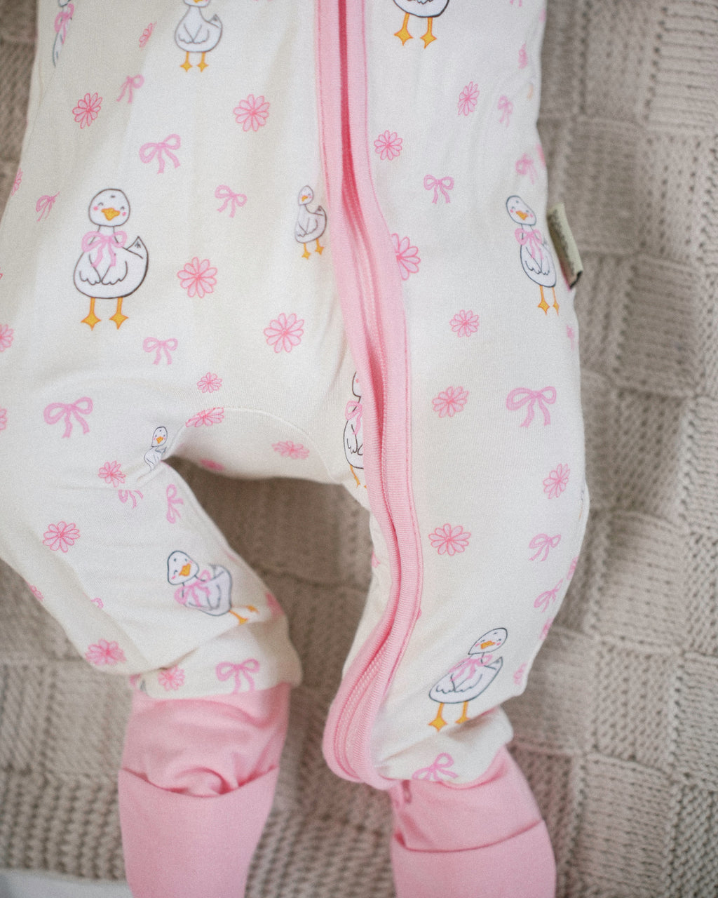 DUCKIE ZIP ROMPER